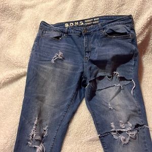 Ripped mid rise jeans
